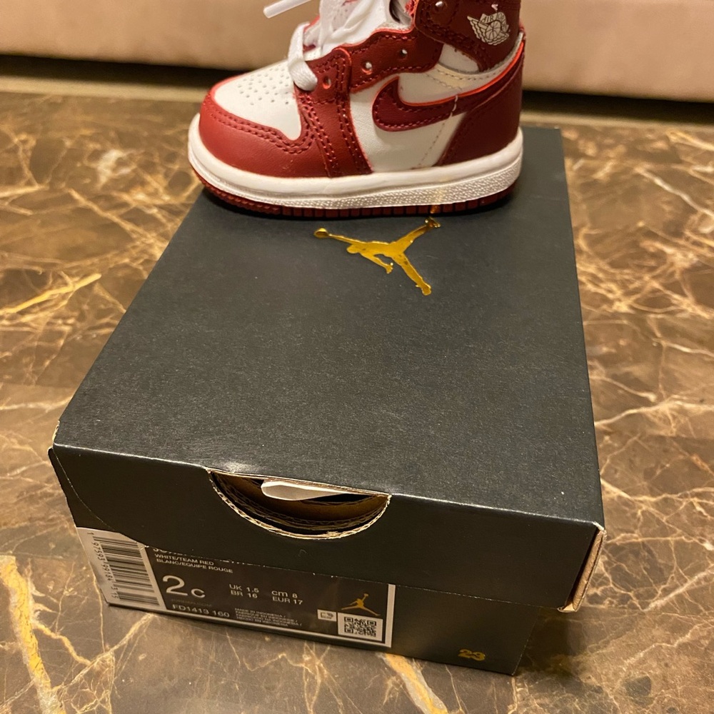 Never Worn Jordan Red and White High-Top Sneakers